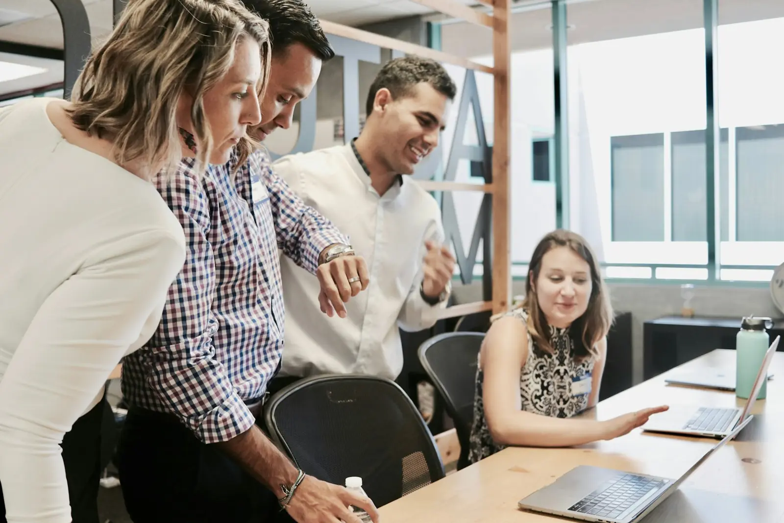 Recruiters and hiring managers collaborating