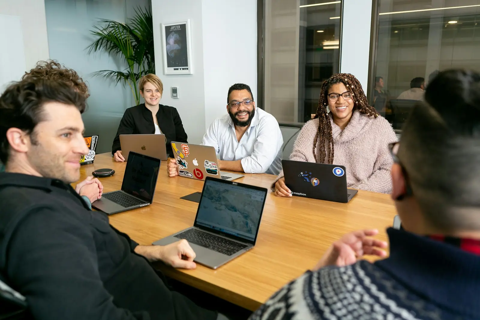 A HYRA hiring team working together