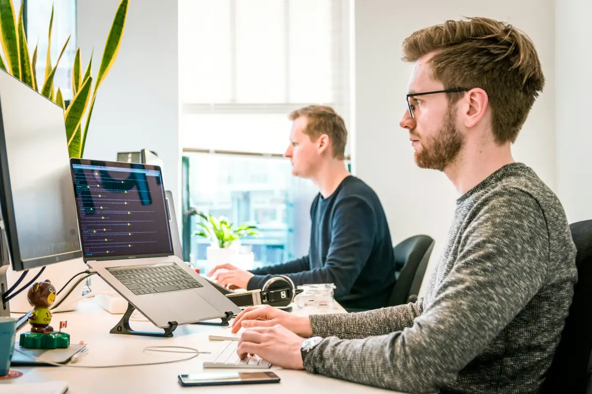 IT professionals collaborating on a staffing requirement
